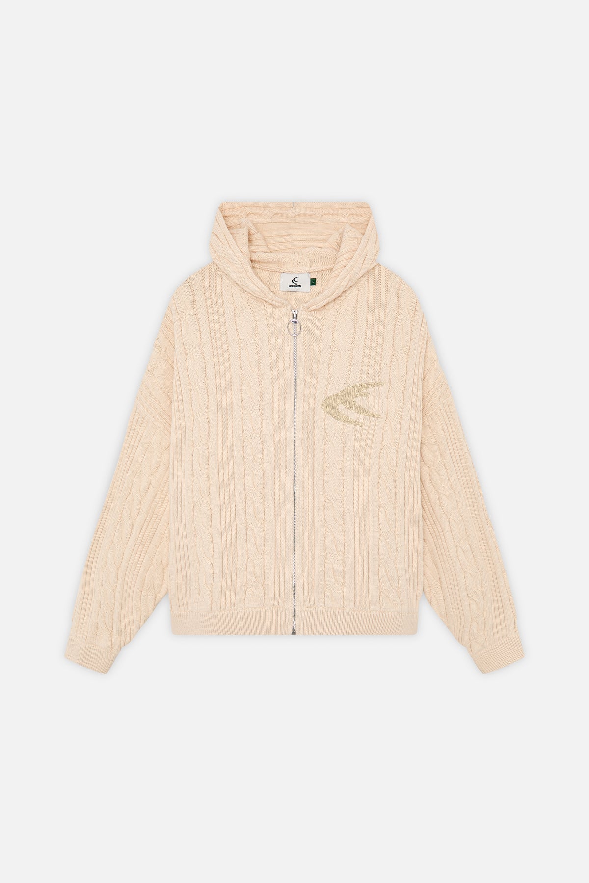 Tejido de punto con cremallera color crudo con leche