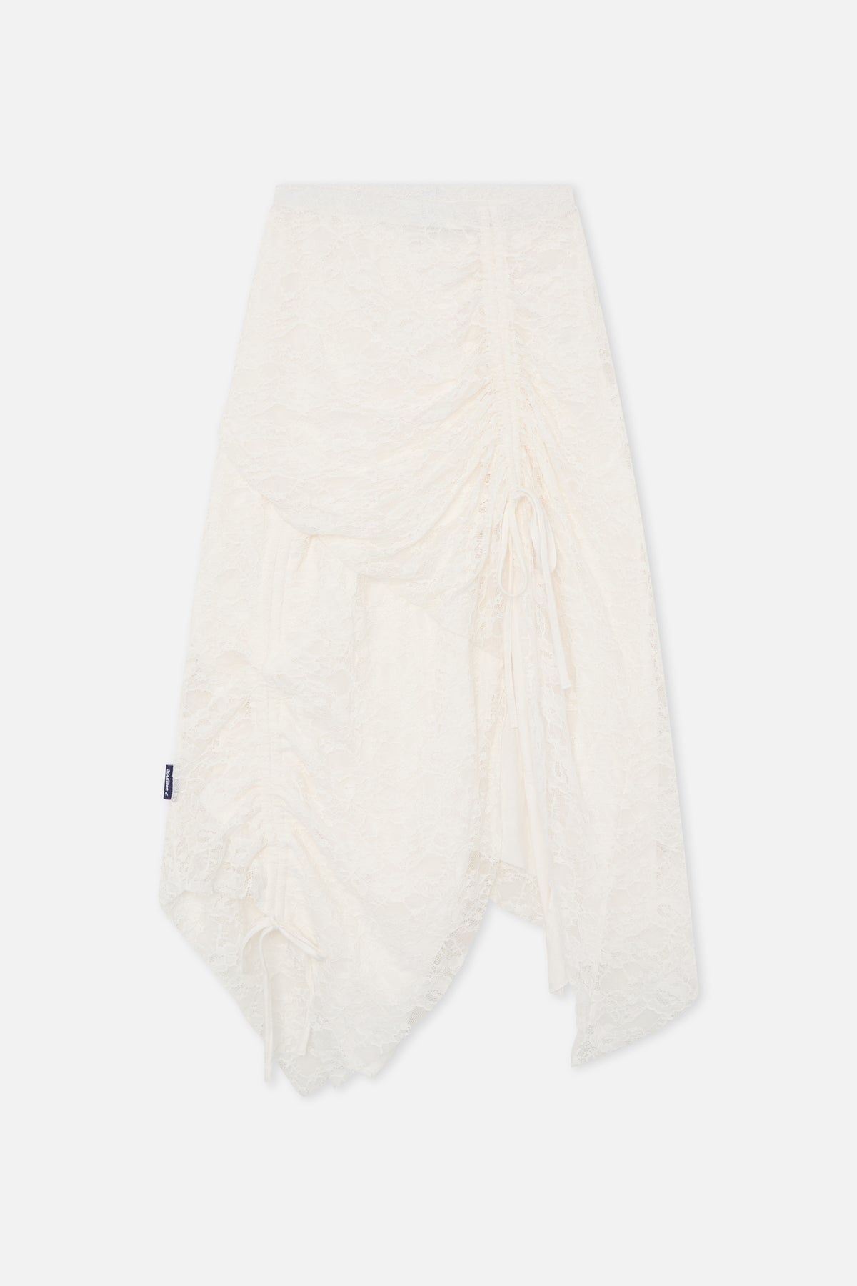 Falda blanca de encaje asimétrico
