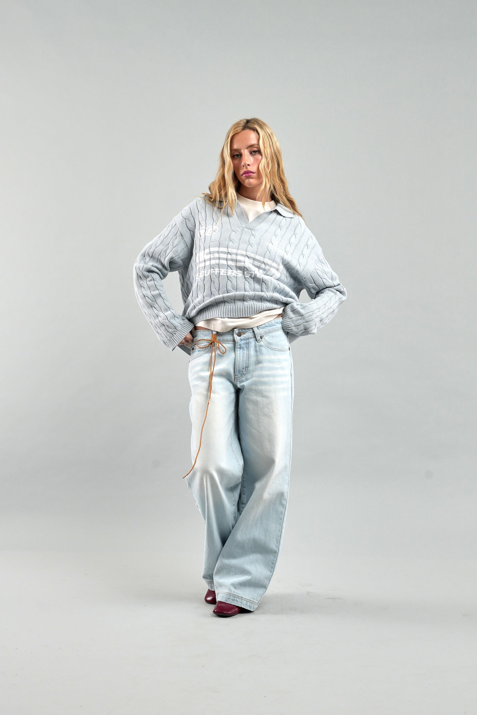 Polo azul claro tipo gabardina