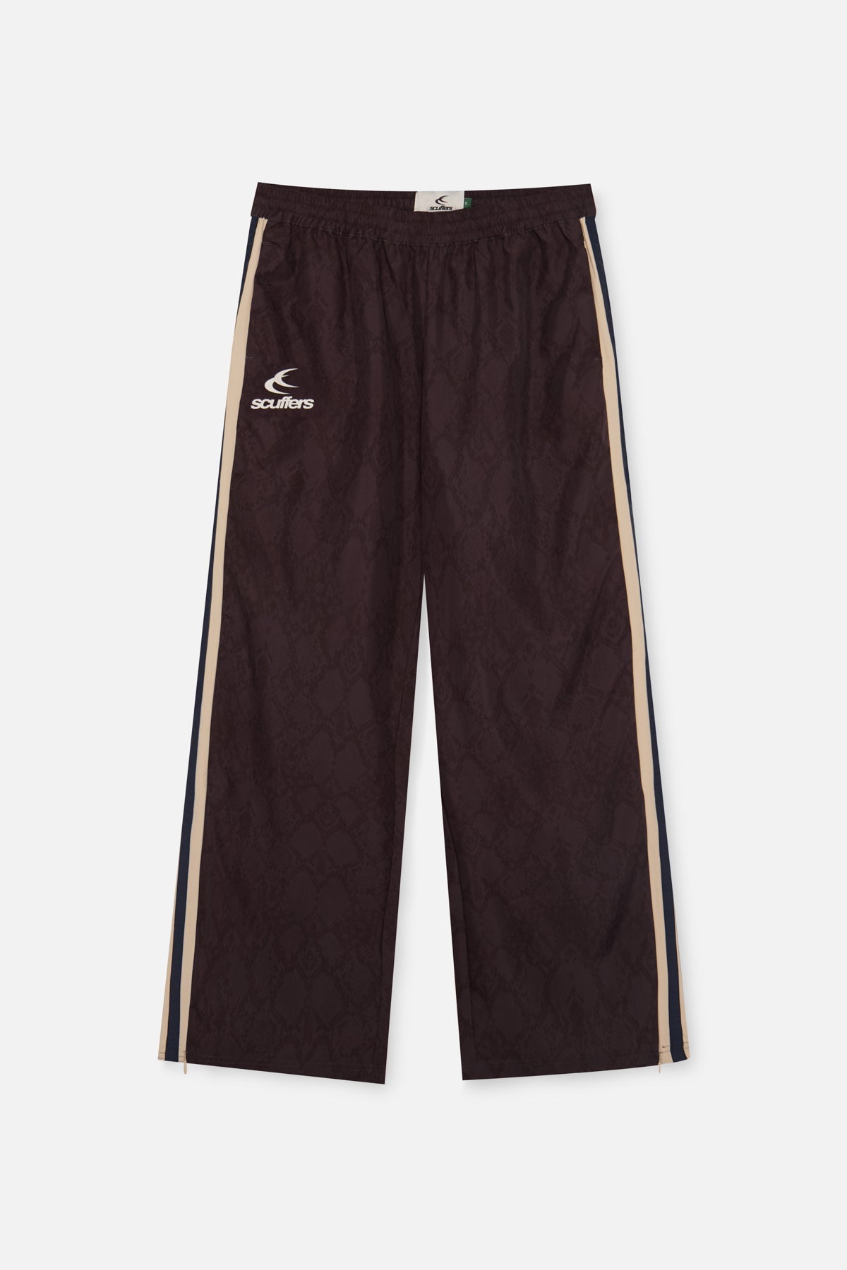 Pantalones técnicos oscuros de serpiente